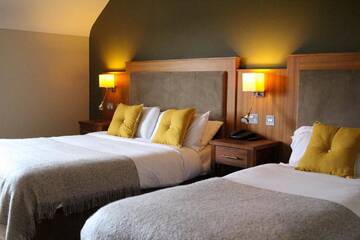 Фото номера Семейный номер Отель Fiddle + Bow Hotel г. Дулин 9